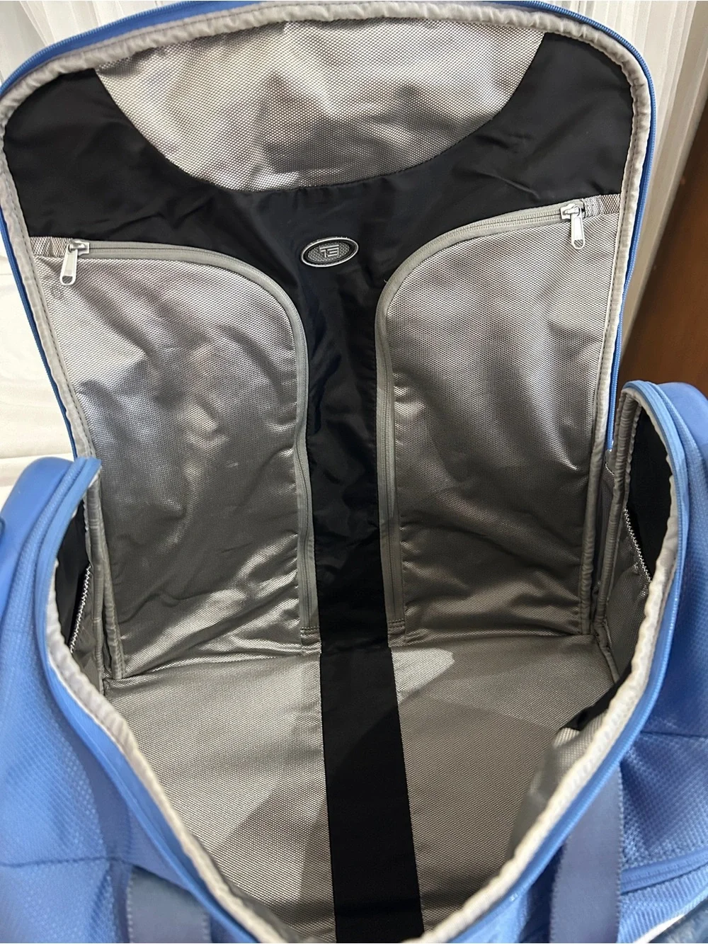 Tumi Light Blue Duffel Bag with Front & Side Pockets 21”
